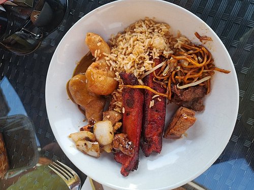 Plate of BBQ spare ribs, chicken balls, egg fried rice and chow mein noodles from Jumbo