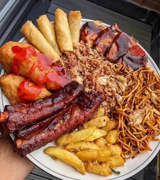 Roast pork, salt and pepper chips, sesame prawn toast and Singapore fried rice
